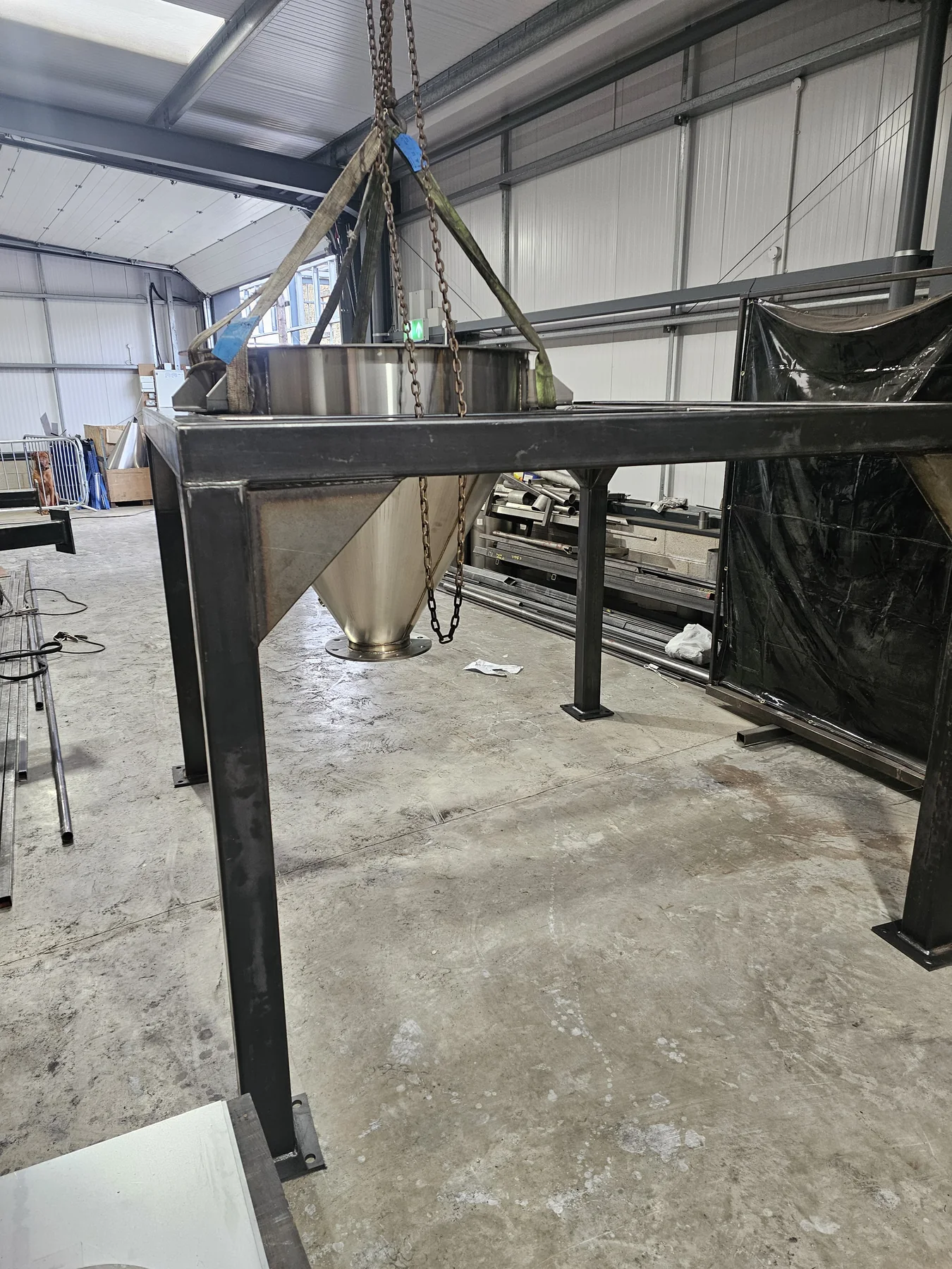 Large fabricated hopper and support frame
