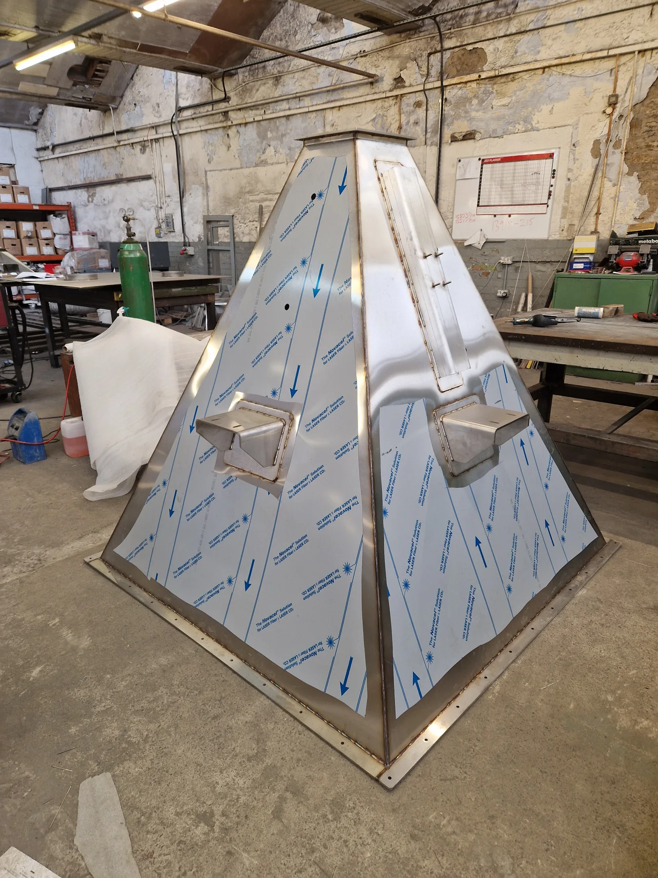 Angular fabricated hopper-style section