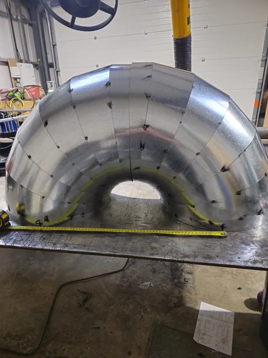 Large segmented fabricated bend