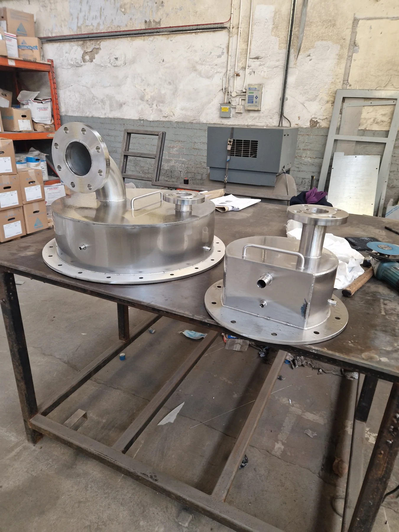 Fabricated flanged components and sheet-metal parts in the Zeus workshop